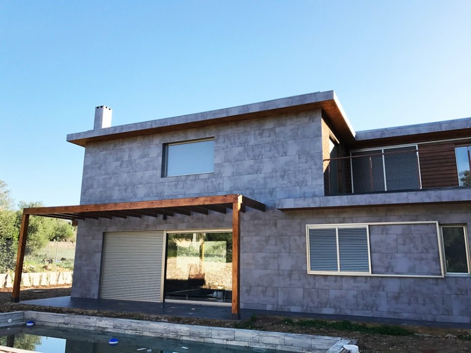 Casas eficientes y sostenibles construidas con módulos de entramado ligero de madera Casas eficientes y sostenibles construidas con módulos de entramado ligero de madera